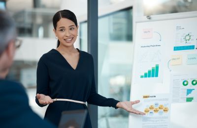Finance professionals attending an accounting conference led by an industry expert.