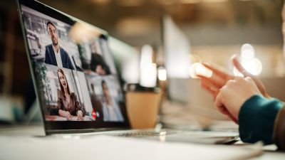 Person taking webinar on computer 