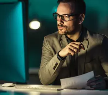 Man at Computer at Night