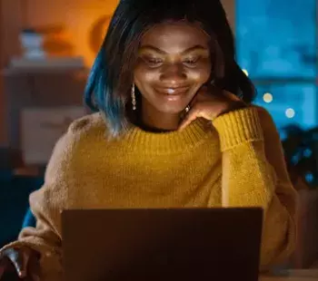 Woman at Laptop at Night
