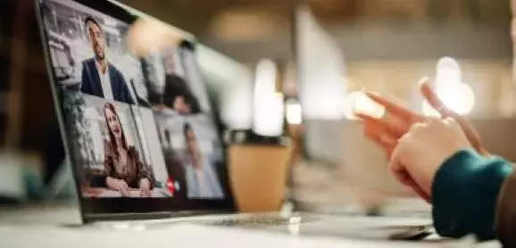 Person taking webinar on computer 