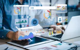 Man at Laptop with Planning Icons